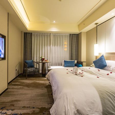 Oriental Hotel Tong Xiang Jiaxing Bagian luar foto